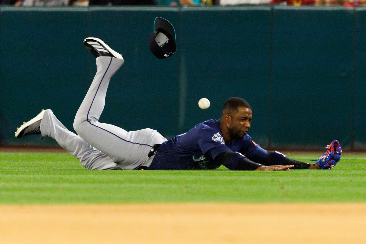Victor Robles #10 of the Seattle Mariners dives for the ball during the game against the Los Angeles Angels at Angel Stadium of Anaheim on April 3, 2026 in Anaheim, California. Victor Robles #10 of the Seattle Mariners dives for the ball during the game against the Los Angeles Angels at Angel Stadium of Anaheim on April 3, 2026 in Anaheim, California.