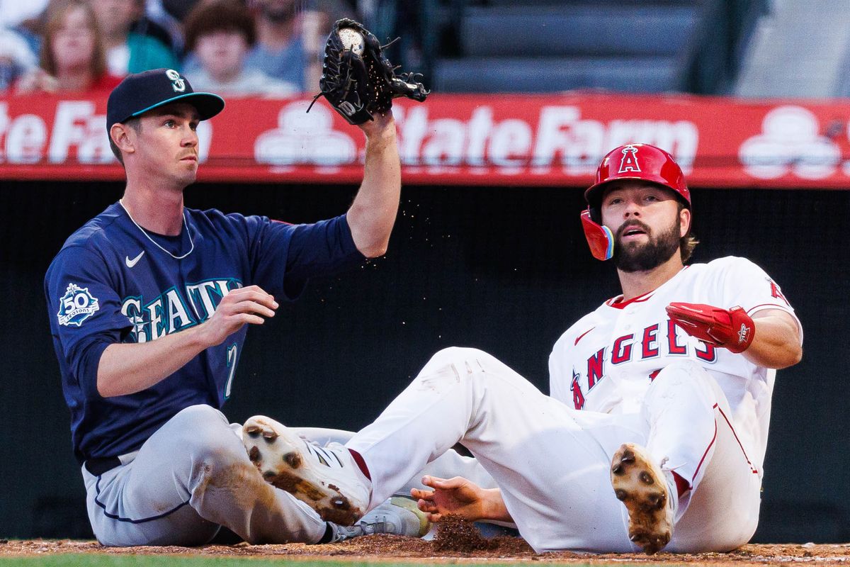 Emerson Hancock #26 of the Seattle Mariners tags for an out during an MLB match against the Los Angeles Angels at Angel Stadium on April 4, 2026 in Anaheim, California. Emerson Hancock #26 of the Seattle Mariners tags for an out during an MLB match against the Los Angeles Angels at Angel Stadium on April 4, 2026 in Anaheim, California.