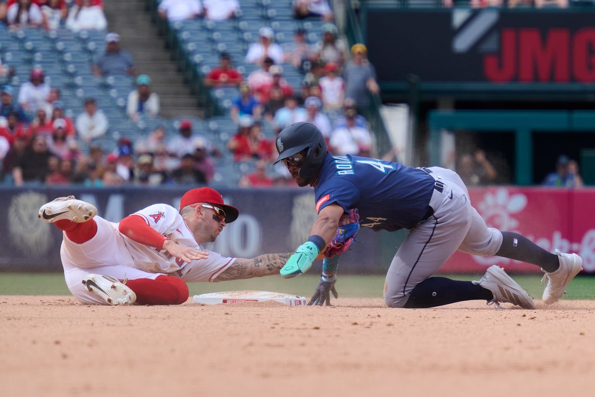 The Los Angeles Angels Zach Neto #9 gets The Seattle Mariners Julio Rodríguez #44 out at second during an MLB game against the Seattle Mariners, April 5th, 2026 in Anaheim California. The Los Angeles Angels Zach Neto #9 gets The Seattle Mariners Julio Rodríguez #44 out at second during an MLB game against the Seattle Mariners, April 5th, 2026 in Anaheim California.
