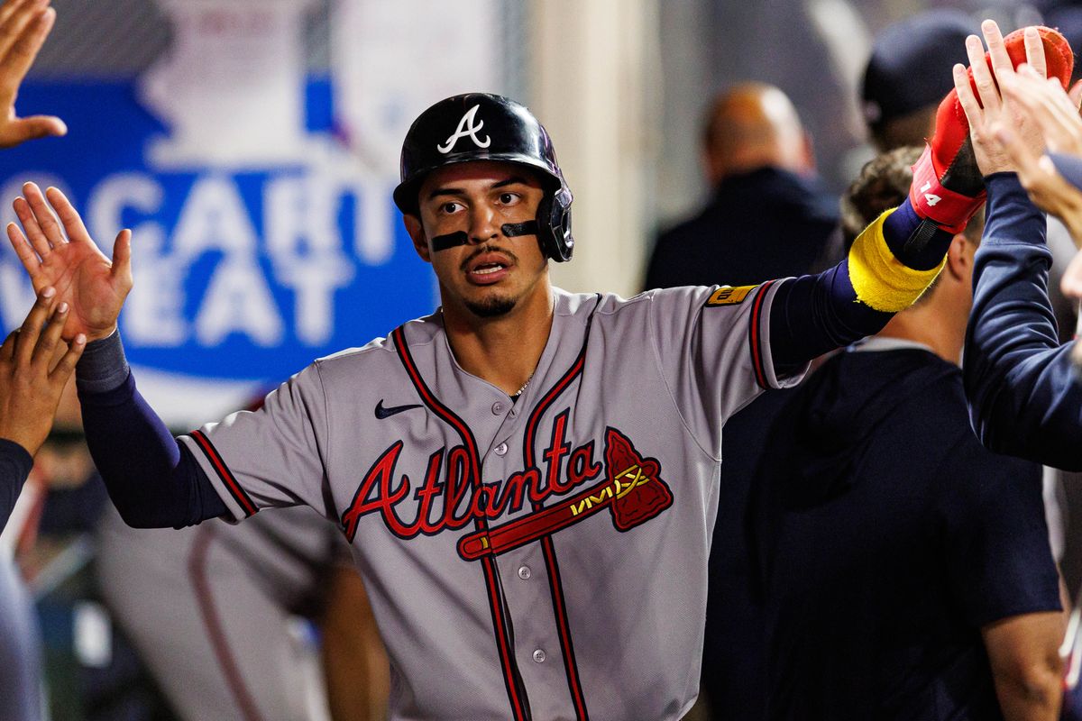 Mauricio Dubón #14 of the Atlanta Braves celebrates after scoring a run during an MLB game against the Los Angeles Angels at Angel Stadium on April 7, 2026 in Anaheim, California. Mauricio Dubón #14 of the Atlanta Braves celebrates after scoring a run during an MLB game against the Los Angeles Angels at Angel Stadium on April 7, 2026 in Anaheim, California.