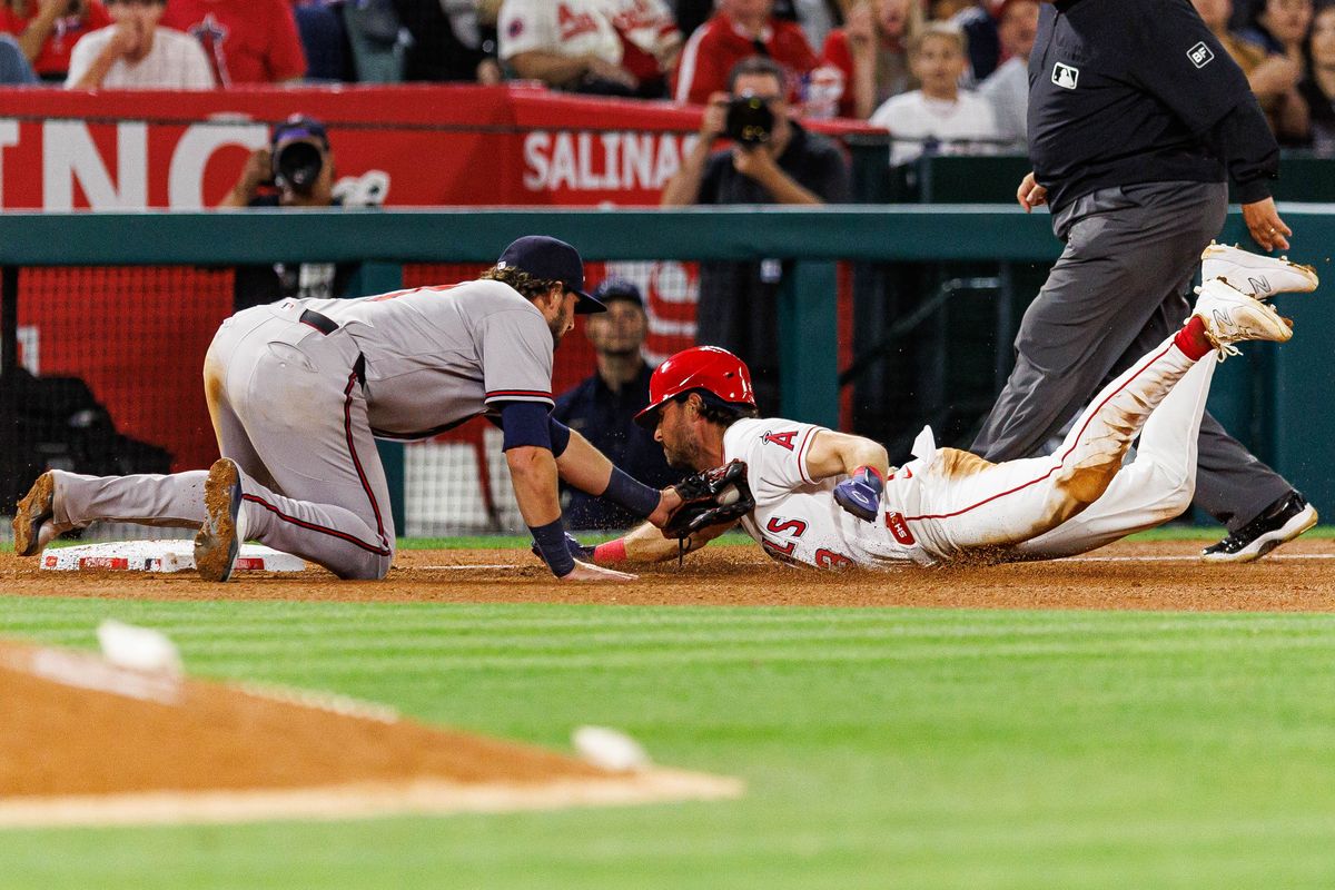 Austin Riley #27 of the Atlanta Braves tags Josh Lowe #3 of the Los Angeles Angels for an out during an MLB game against the Los Angeles Angels at Angel Stadium on April 7, 2026 in Anaheim, California. Austin Riley #27 of the Atlanta Braves tags Josh Lowe #3 of the Los Angeles Angels for an out during an MLB game against the Los Angeles Angels at Angel Stadium on April 7, 2026 in Anaheim, California.