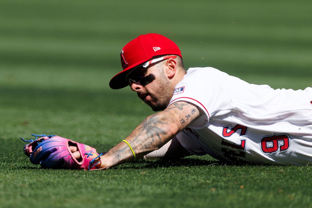 Zach Neto #9 of the Los Angeles Angels dives for a ground ball during the game against the Atlanta Braves at Angel Stadium of Anaheim on April 8, 2026 in Anaheim, California. Zach Neto #9 of the Los Angeles Angels dives for a ground ball during the game against the Atlanta Braves at Angel Stadium of Anaheim on April 8, 2026 in Anaheim, California.