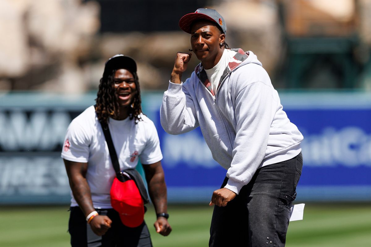 King Miller of the USC Trojans celebrates after throwing out the first pitch before the game between the San Diego Padres and the Los Angeles Angels at Angel Stadium of Anaheim on April 19, 2026 in Anaheim, California.