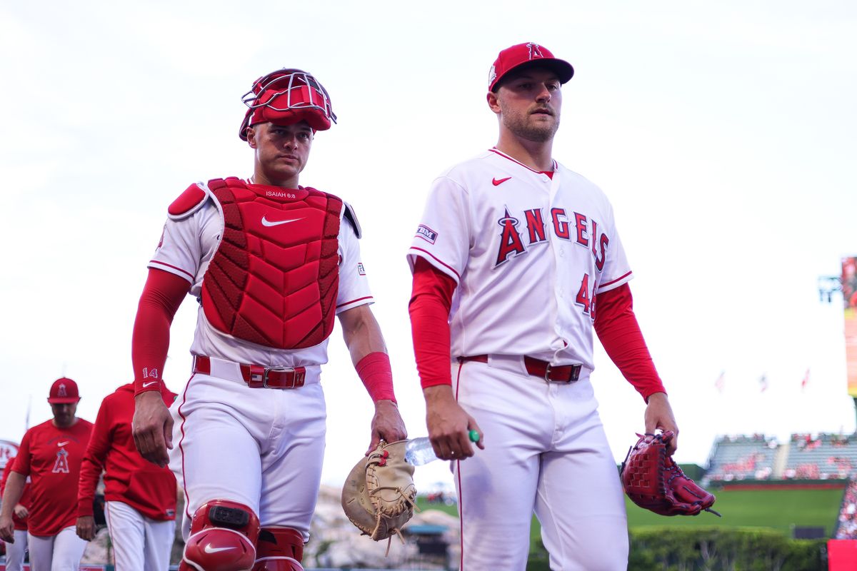 Los Angeles Angels catcher Logan O'Hoppe (14) and left handed pitcher Reid Detmers (48) walk into the dugout before the MLB game against the Toronto Blue Jays Monday April 20th, 2026 at Angel's Stadium in Anaheim, Calif.