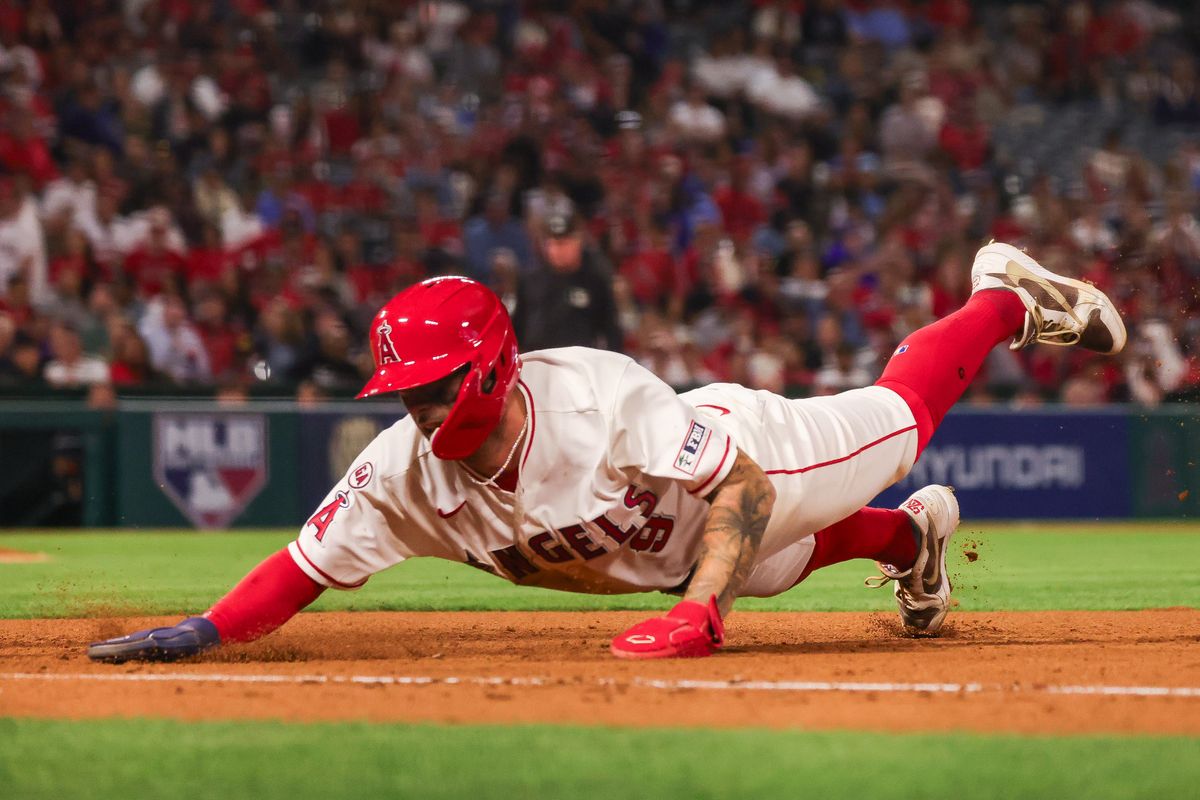 Los Angeles Angels infielder Zach Neto (9) dives during the MLB game against the Toronto Blue Jays Monday April 20th, 2026 at Angel's Stadium in Anaheim, Calif.