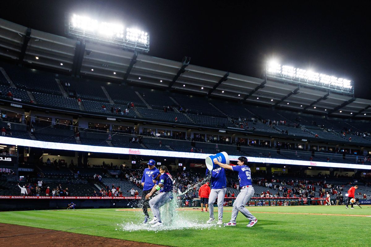 Lenyn Sosa #50 of the Toronto Blue Jays receives a gatorade shower after an MLB game against the Los Angeles Angels at Angel Stadium on April 21, 2026 in Anaheim, California.