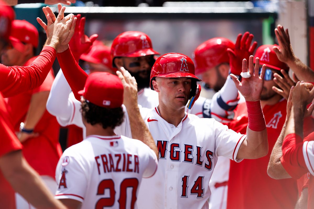 Logan O’Hoppe #14 of the Los Angeles Angels celebrates in the dugout during the game against the Toronto Blue Jays at Angel Stadium of Anaheim on April 22, 2026 in Anaheim, California.