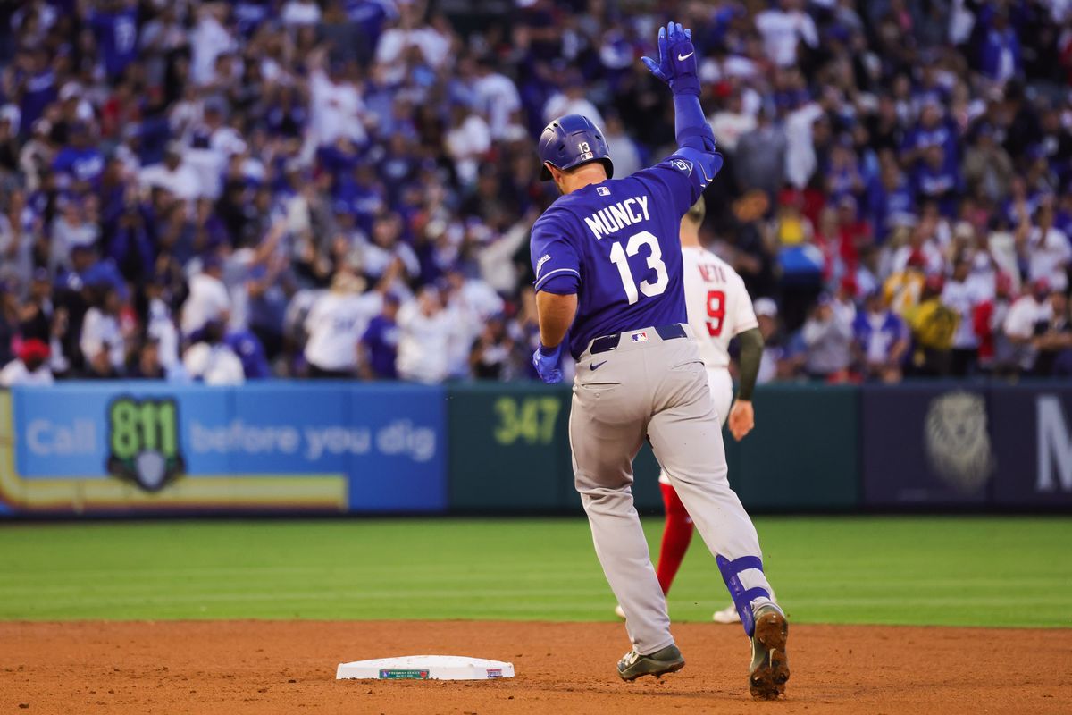 Los Angeles Dodgers infielder Max Muncy (13) celebrates during the MLB game against the Los Angeles Angels Friday May 15th, 2026 at Angel's Stadium in Anaheim, Calif.