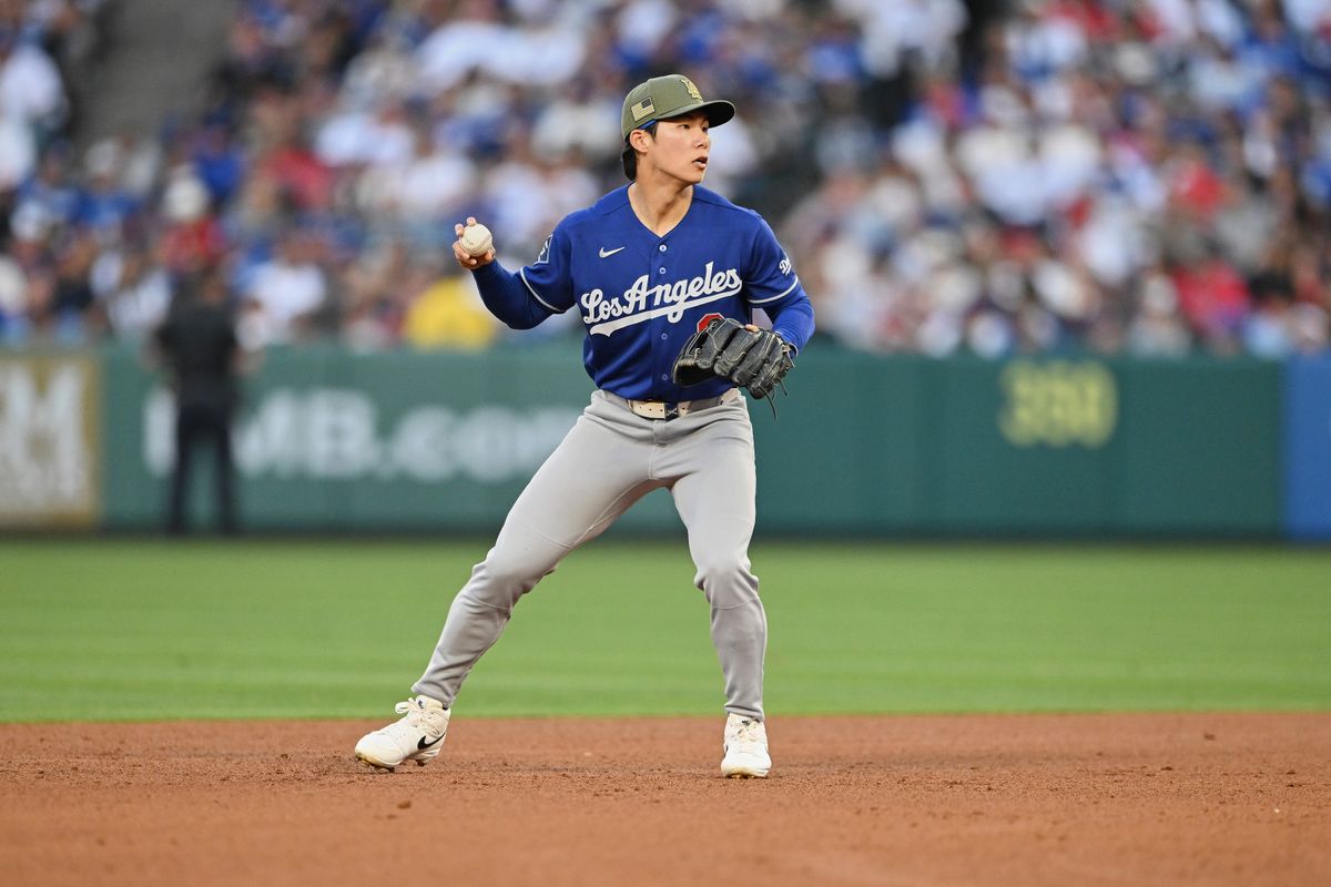 The Los Angeles Dodgers Hyeseong Kim #6 catches at short stop during an MLB game against the Los Angeles Angels, May 16th, 2026 at Angels Stadium in Anaheim, California.