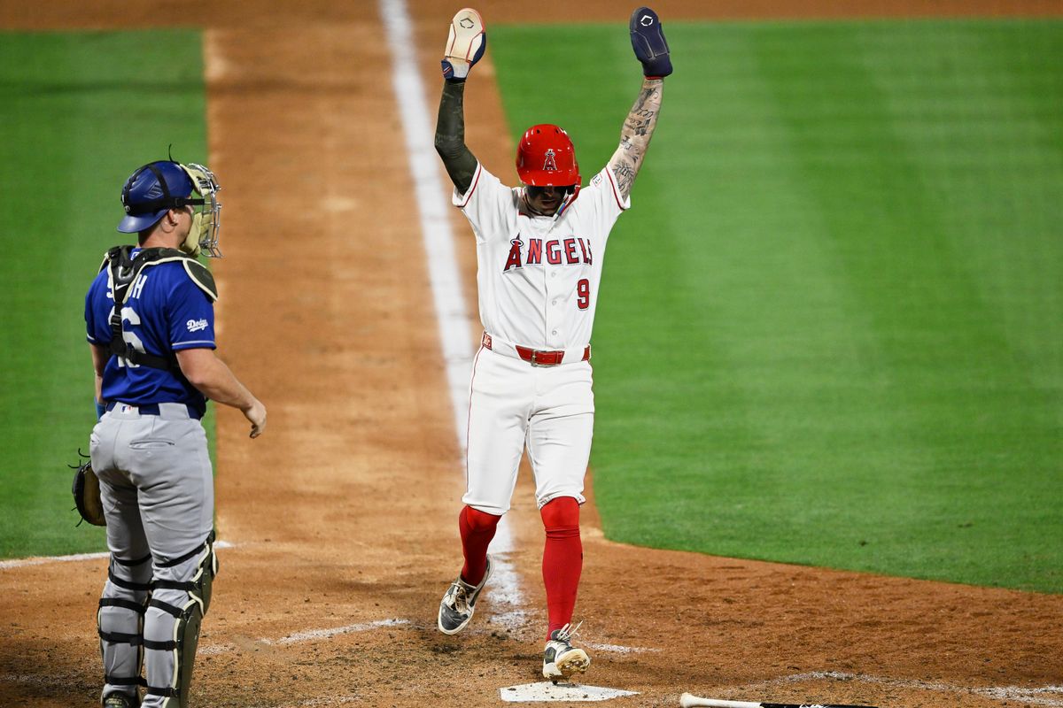 The Los Angeles Angels Zach Neto #9 celebrates a run during an MLB game against The Los Angeles Dodgers on May 16th, 2026 at Angels Stadium in Anaheim, California.