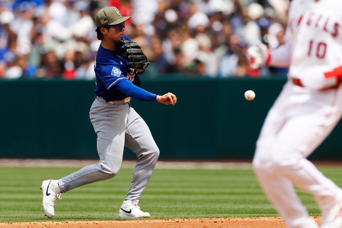 Hyeseong Kim #6 of the Los Angeles Dodgers throws during the game against the Los Angeles Angels at Angel Stadium of Anaheim on May 17, 2026 in Anaheim, California.