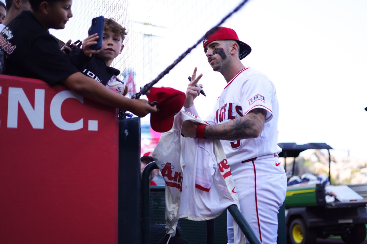 Los Angeles Angels infielder Zach Neto (9) takes a photo with fans before the MLB game against the Athletics Monday May 18th, 2026 at Angel's Stadium in Anaheim, Calif. Los Angeles Angels infielder Zach Neto (9) takes a photo with fans before the MLB game against the Athletics Monday May 18th, 2026 at Angel's Stadium in Anaheim, Calif.