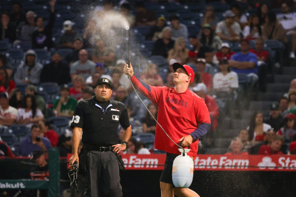 Los Angeles Angels grounds crew sprays water during the MLB game against the Athletics Monday May 18th, 2026 at Angel's Stadium in Anaheim, Calif. Los Angeles Angels grounds crew sprays water during the MLB game against the Athletics Monday May 18th, 2026 at Angel's Stadium in Anaheim, Calif.