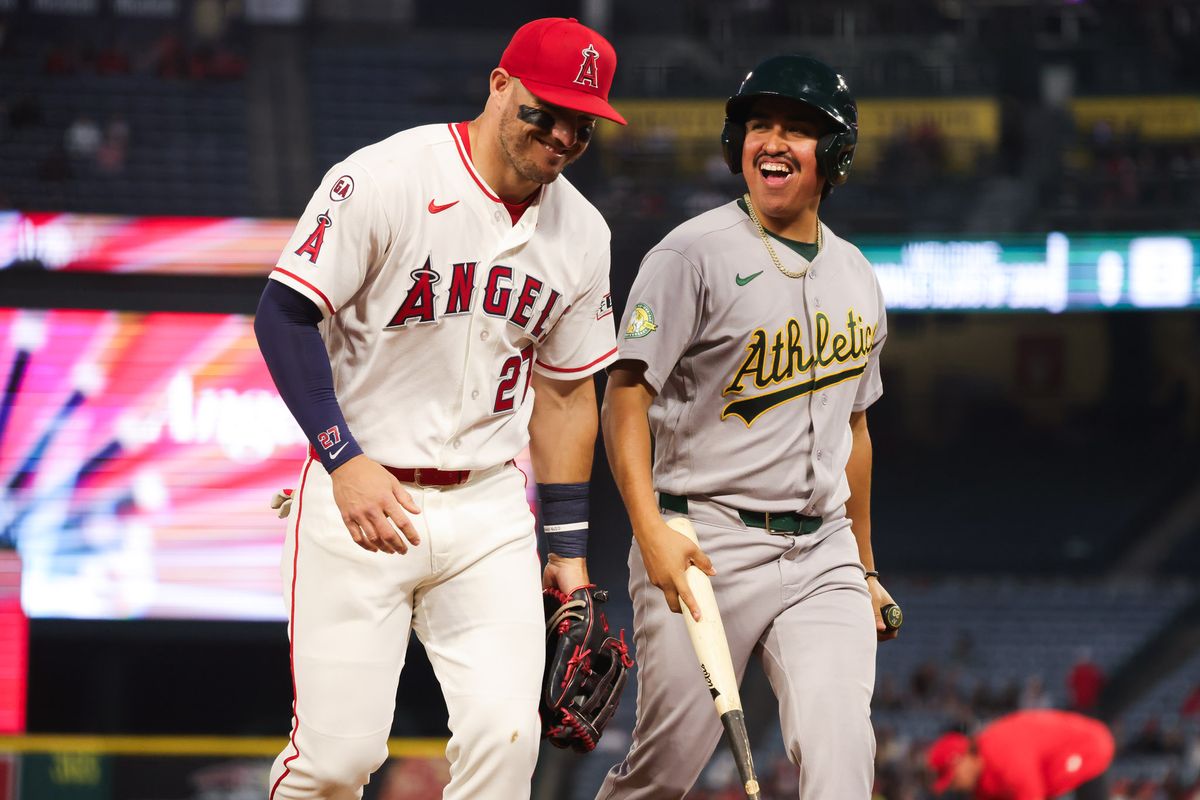 Los Angeles Angels outfielder Mike Trout (27) smiles with Athletics bat boy during the MLB game Monday May 18th, 2026 at Angel's Stadium in Anaheim, Calif. Los Angeles Angels outfielder Mike Trout (27) smiles with Athletics bat boy during the MLB game Monday May 18th, 2026 at Angel's Stadium in Anaheim, Calif.