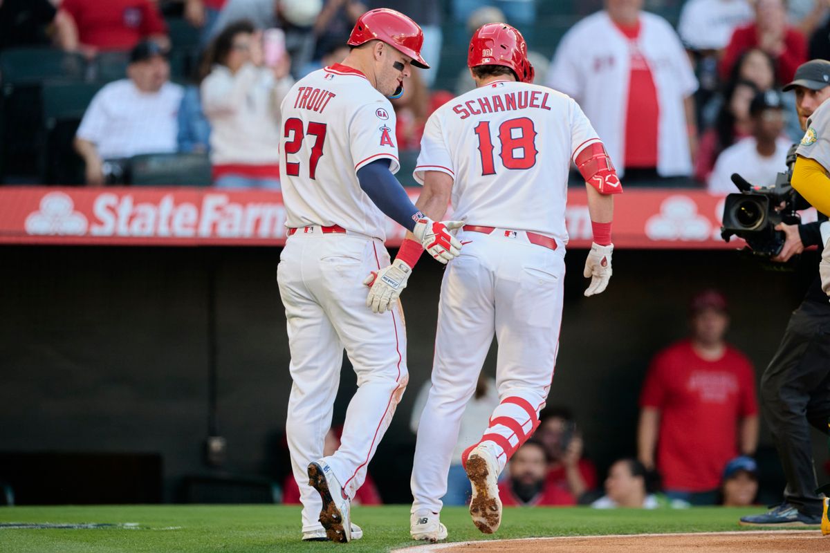 The Los Angeles Angels Mike Trout #27 and Nolan Schanuel #18 celebrate a home run during an MLB game against The Athletics on May 21st, 2026 at Angels Stadium in Anaheim, California.