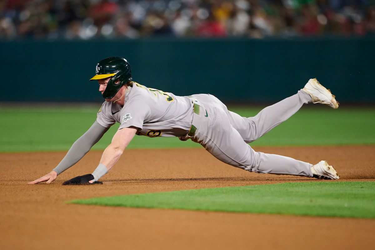 The Athletics Henry Bolte #33 slides into second base during an MLB game against The Los Angeles Angels on May 21st, 2026 at Angels Stadium in Anaheim, California.