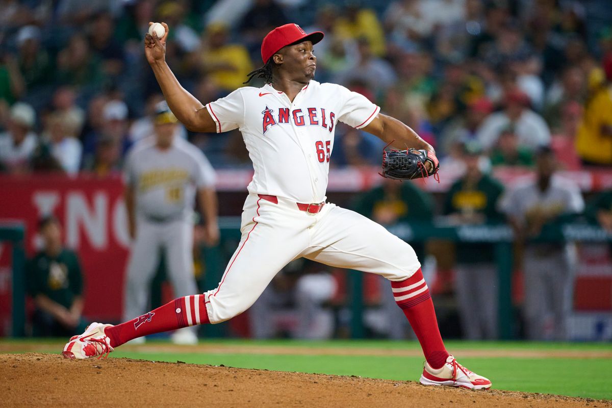 The Los Angeles Angels José Fermin #65 pitches during an MLB game against The Athletics on May 21st, 2026 at Angels Stadium in Anaheim, California.