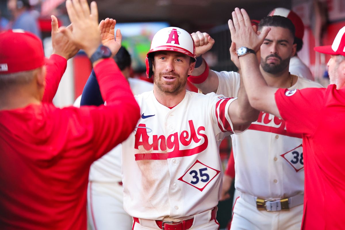 Los Angeles Angels infielder Donovan Walton (35) celebrates scoring a run during an MLB game against the Colorado Rockies on June 1, 2026 in Anaheim, CA.