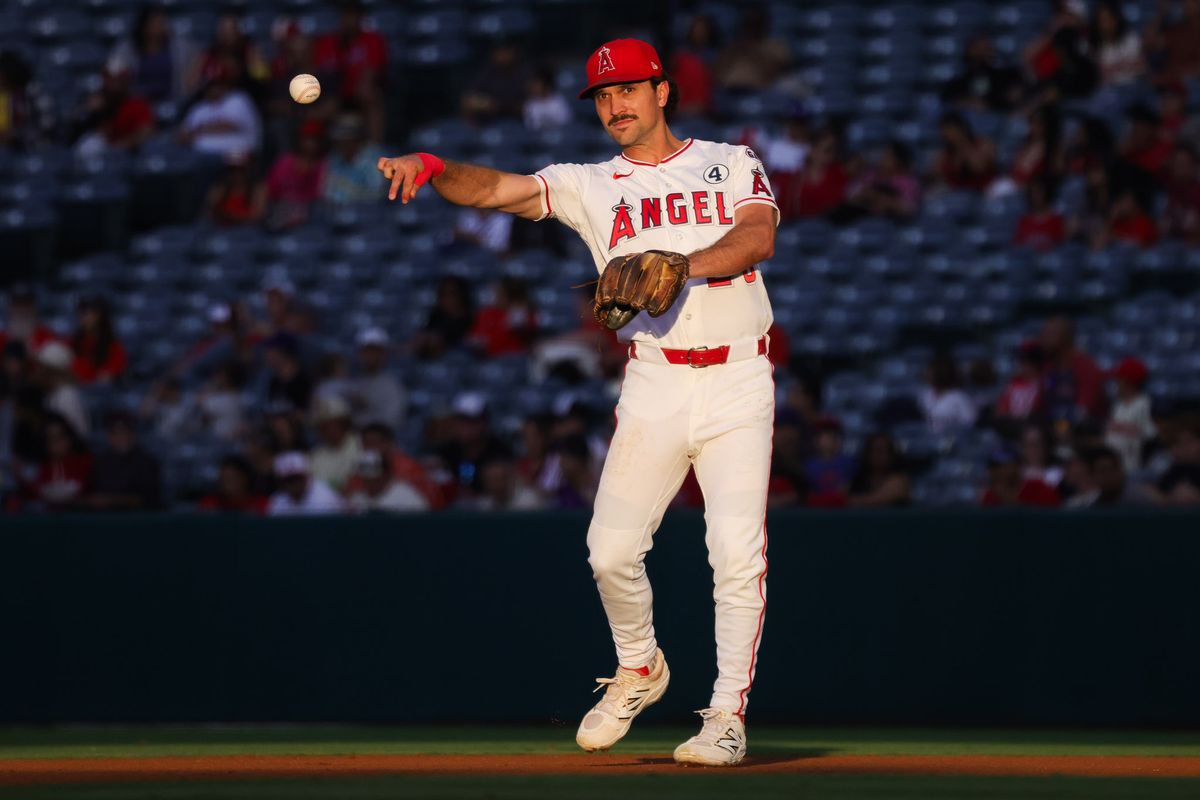 Los Angeles Angels infielder Adam Frazier (20) throws the ball during the MLB game against the Colorado Rockies Tuesday June 2nd, 2026 at Angel's Stadium in Anaheim, Calif.