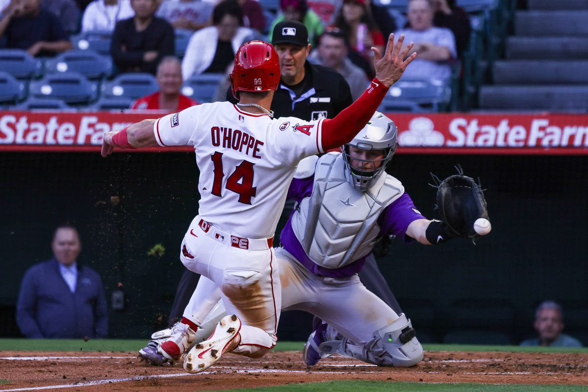 Los Angeles Angels catcher Logan O'Hoppe (14) slides into home plate during the MLB game against the Colorado Rockies Tuesday June 3rd, 2026 at Angel's Stadium in Anaheim, Calif.