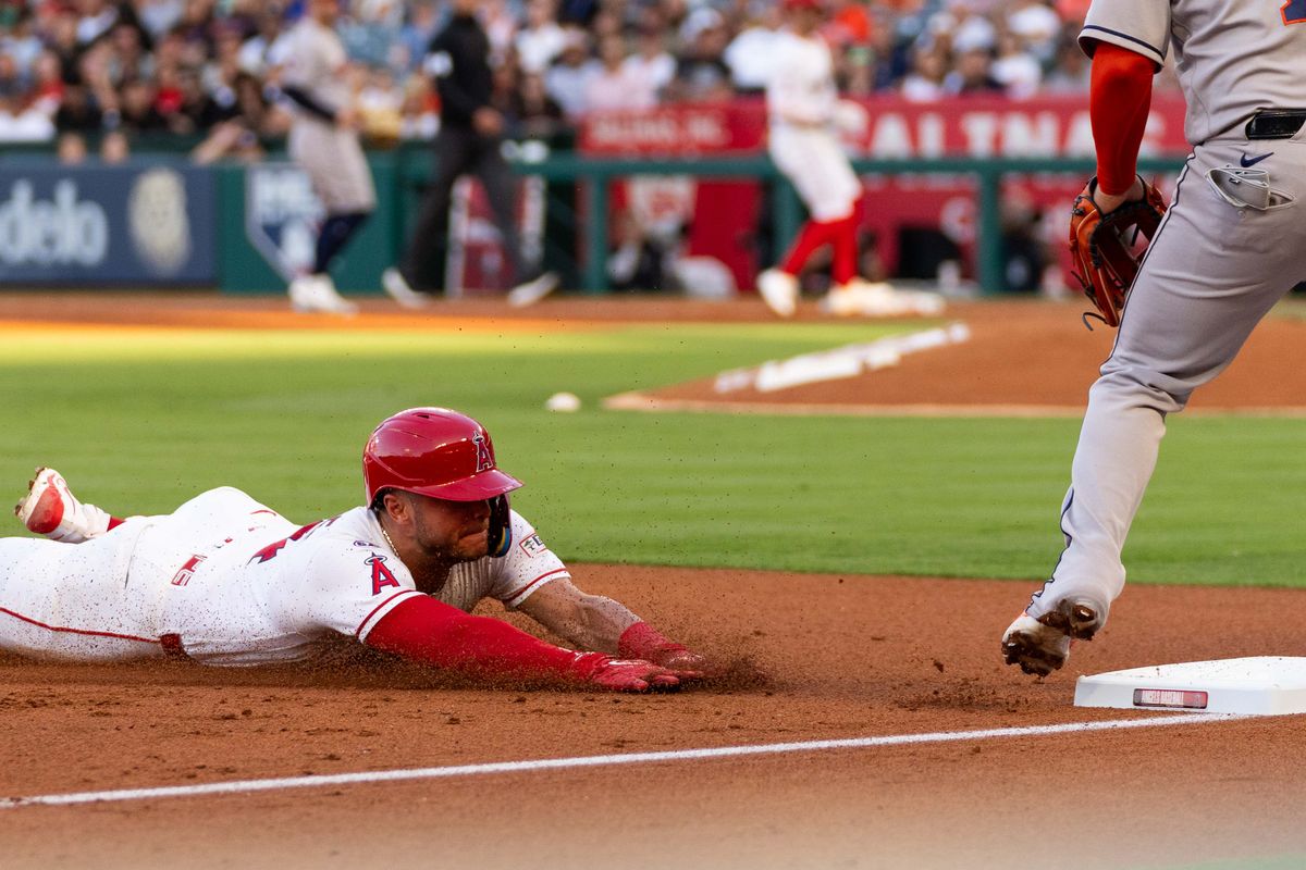 Los Angeles Angels catcher Logan O’ Hoppe (14) dives during the MLB game against the Houston Astros Monday June 8th, 2026 at Angel's Stadium in Anaheim, Calif. Los Angeles Angels catcher Logan O’ Hoppe (14) dives during the MLB game against the Houston Astros Monday June 8th, 2026 at Angel's Stadium in Anaheim, Calif.