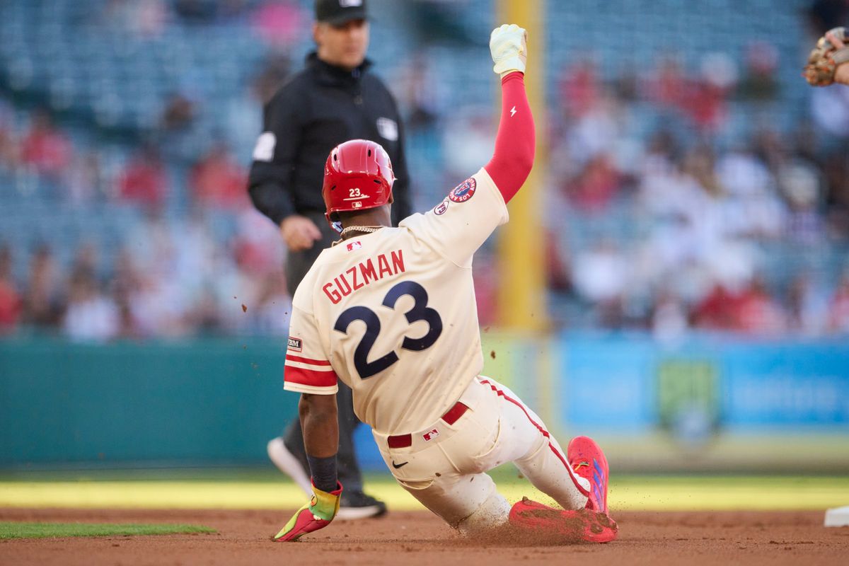 The Los Angeles Angels Denzer Guzman #23 slides into second base during an MLB game against The Baltimore Orioles on June 22nd, 2026 at Angel Stadium in Anaheim, California.