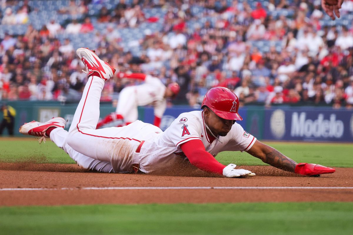 Los Angeles Angels infielder Christian Moore (4) dives during the MLB game against the Baltimore Orioles Tuesday June 23rd, 2026 at Angel Stadium in Anaheim, Calif. Los Angeles Angels infielder Christian Moore (4) dives during the MLB game against the Baltimore Orioles Tuesday June 23rd, 2026 at Angel Stadium in Anaheim, Calif.