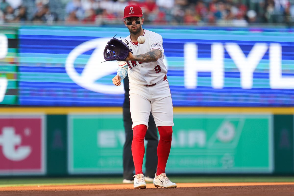 Zach Neto #9 of the Los Angeles Angels catches a ball during an MLB game against the Las Vegas Athletics on June 27, 2026 in Anaheim, CA.