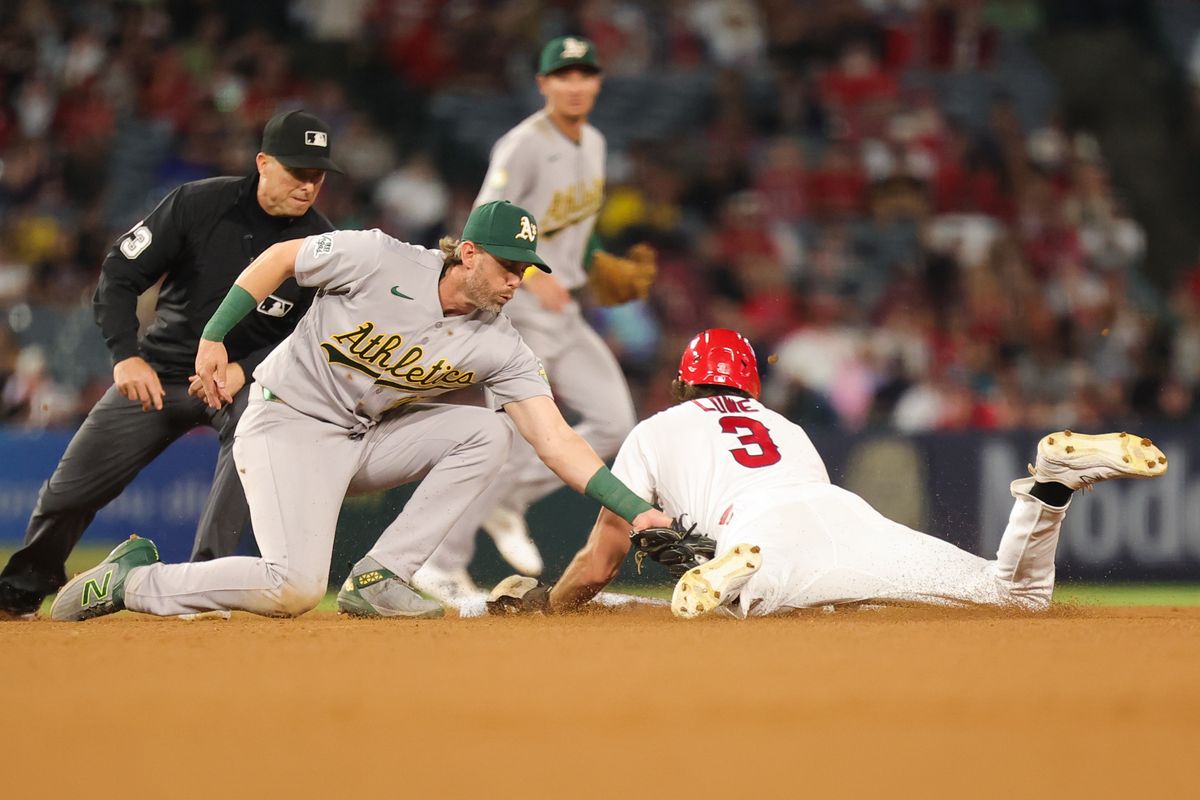 Josh Lowe #3 of the Los Angeles Angels safely slides back to second base during an MLB game against the Las Vegas Athletics on June 27, 2026 in Anaheim, CA.