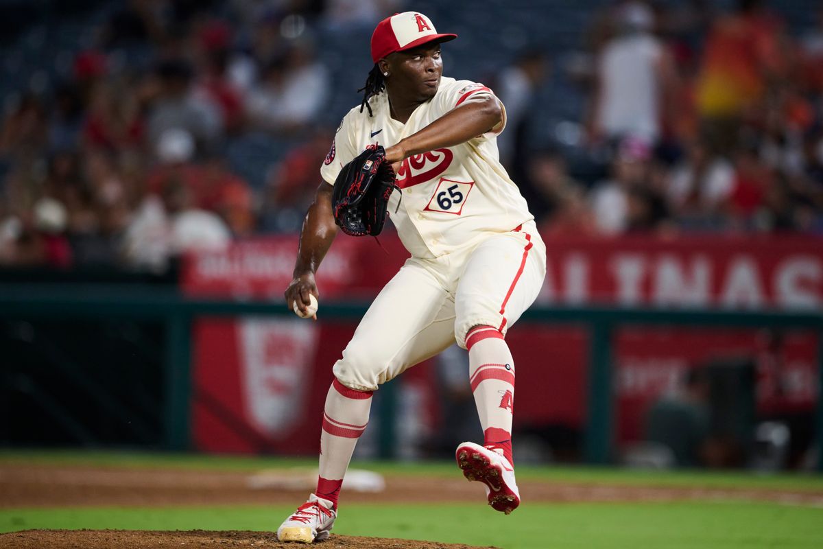 The Los Angeles Angels José Fermin #65 pitches during an MLB game against The Houston Astros on July 28th, 2026 at Angel Stadium in Anaheim, California.