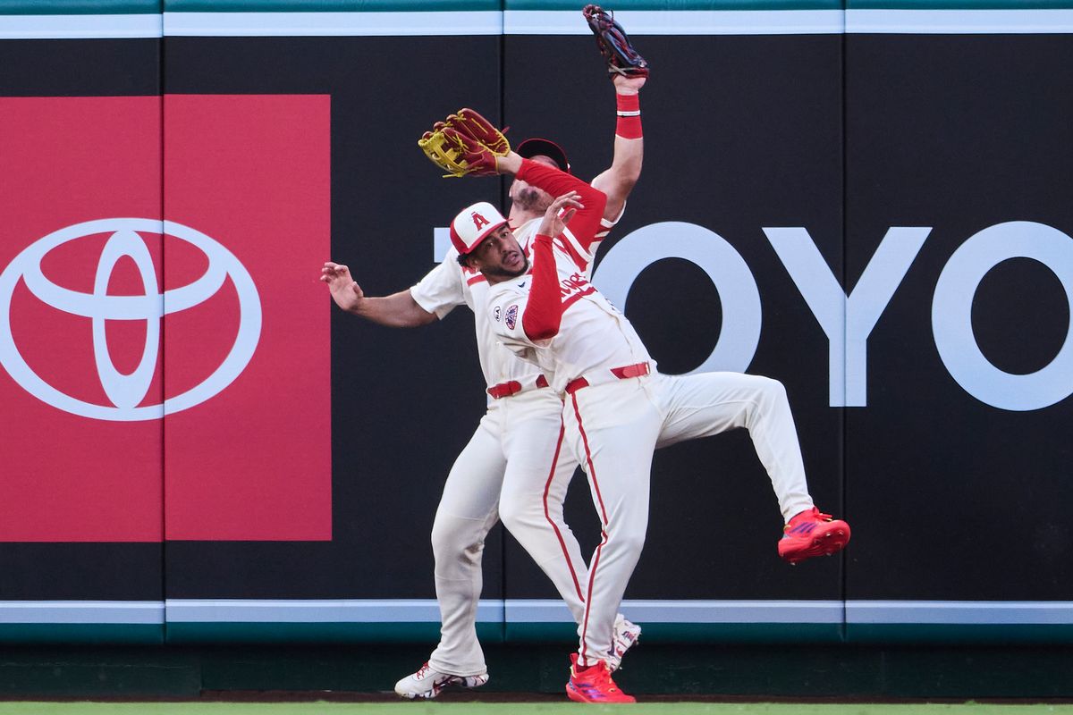 The Los Angeles Angels Mike Trout #27 and Jose Siri #28 collide for an outfield catch during an MLB game against The Milwaukee Brewers on July 31st, 2026 at Angel Stadium in Anaheim, California. The Los Angeles Angels Mike Trout #27 and Jose Siri #28 collide for an outfield catch during an MLB game against The Milwaukee Brewers on July 31st, 2026 at Angel Stadium in Anaheim, California.