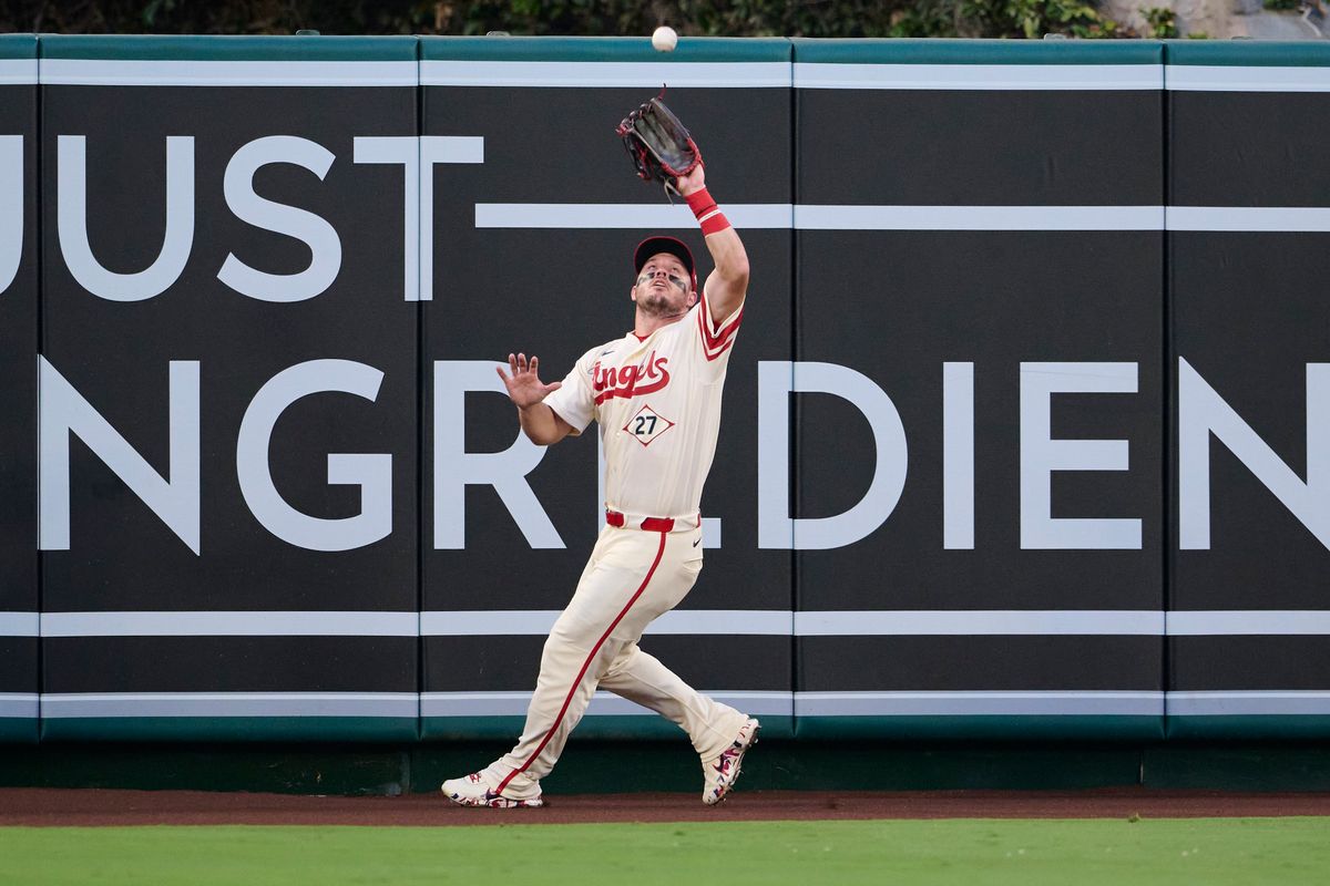 The Los Angeles Angels Mike Trout #27 catches a fly ball during an MLB game against The Milwaukee Brewers on July 31st, 2026 at Angel Stadium in Anaheim, California. The Los Angeles Angels Mike Trout #27 catches a fly ball during an MLB game against The Milwaukee Brewers on July 31st, 2026 at Angel Stadium in Anaheim, California.