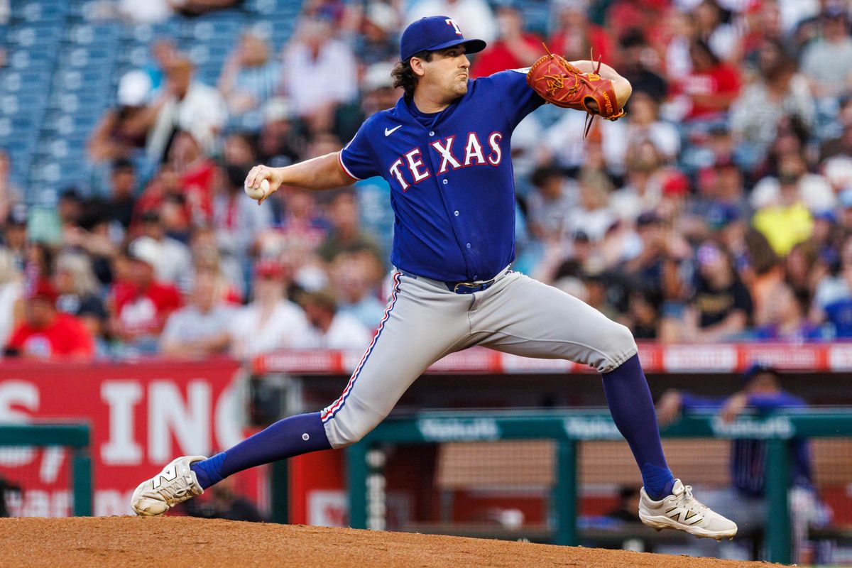 Cal Quantrill #44 of the Texas Rangers throws a pitch during an MLB game against the Los Angeles Angels on August 12, 2026 at Angel Stadium in Anaheim, California.