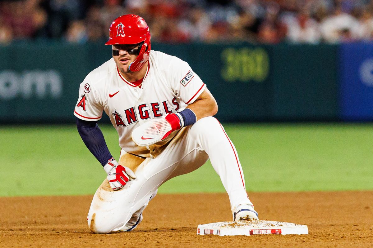 Mike Trout #27 of the Los Angeles Angels after stealing second base during an MLB game against the Texas Rangers on August 12, 2026 at Angel Stadium in Anaheim, California.