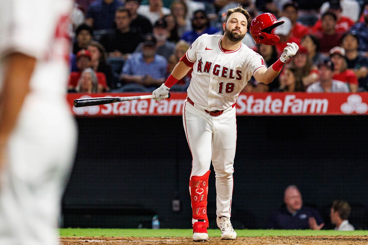 Nolan Schanuel #18 of the Los Angeles Angels loses his helmet during an MLB game against the Texas Rangers on August 12, 2026 at Angel Stadium in Anaheim, California.