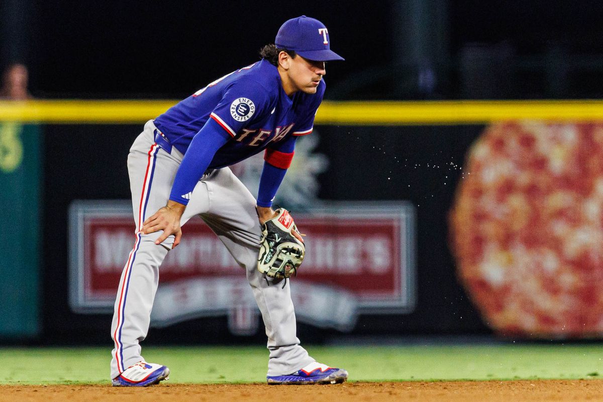 Nicky Lopez #33 of the Texas Rangers waits for the ball to come into play during an MLB game against the Los Angeles Angels on August 12, 2026 at Angel Stadium in Anaheim, California.