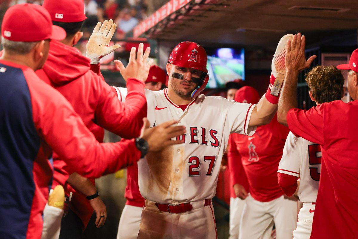 Los Angeles Angels outfielder Mike Trout (27) celebrates in the dugout during the MLB game against the Texas Rangers Thursday August 13th, 2026 at Angel Stadium in Anaheim, Calif. Los Angeles Angels outfielder Mike Trout (27) celebrates in the dugout during the MLB game against the Texas Rangers Thursday August 13th, 2026 at Angel Stadium in Anaheim, Calif.