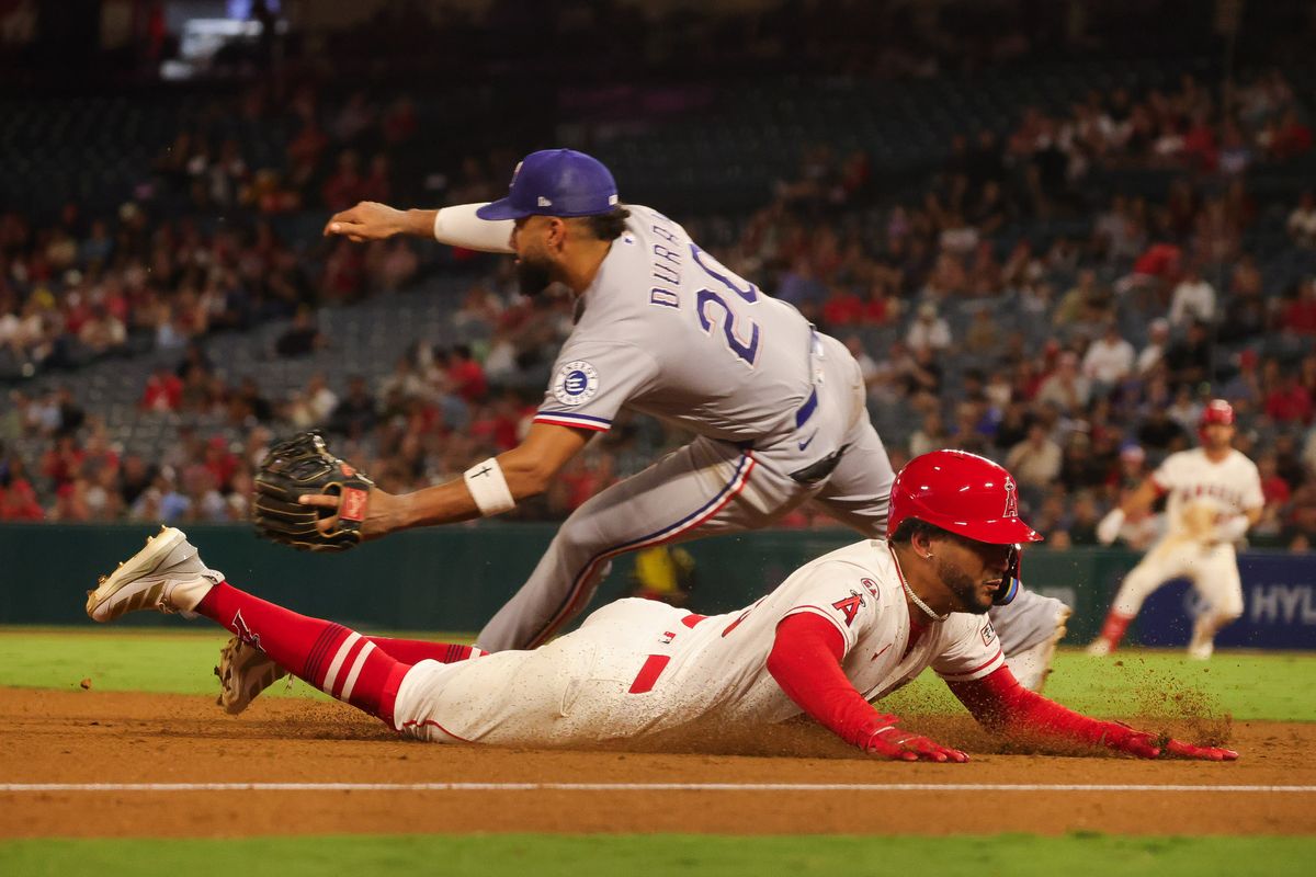 Los Angeles Angels outfielder Jose Siri (28) dives to third base during the MLB game against the Texas Rangers Thursday August 13th, 2026 at Angel Stadium in Anaheim, Calif. Los Angeles Angels outfielder Jose Siri (28) dives to third base during the MLB game against the Texas Rangers Thursday August 13th, 2026 at Angel Stadium in Anaheim, Calif.