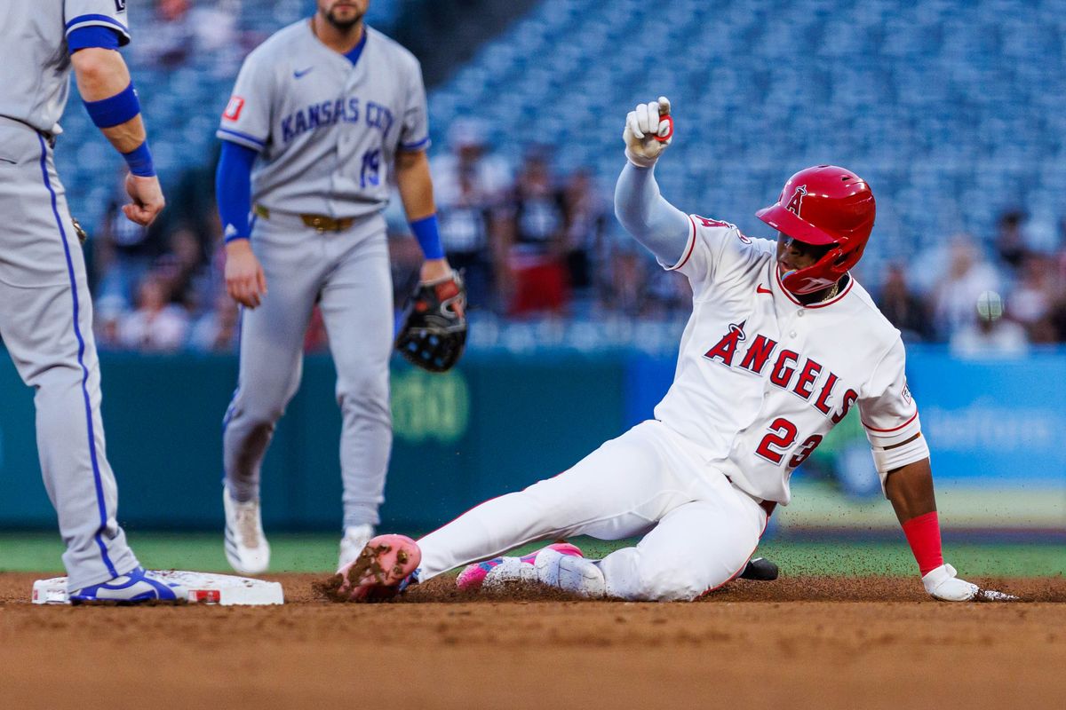 Denzer Guzmán #23 of the Los Angeles Angels slides into second base during an MLB game against the Kansas City Royals on August 14, 2026 at Angel Stadium in Anaheim, California.