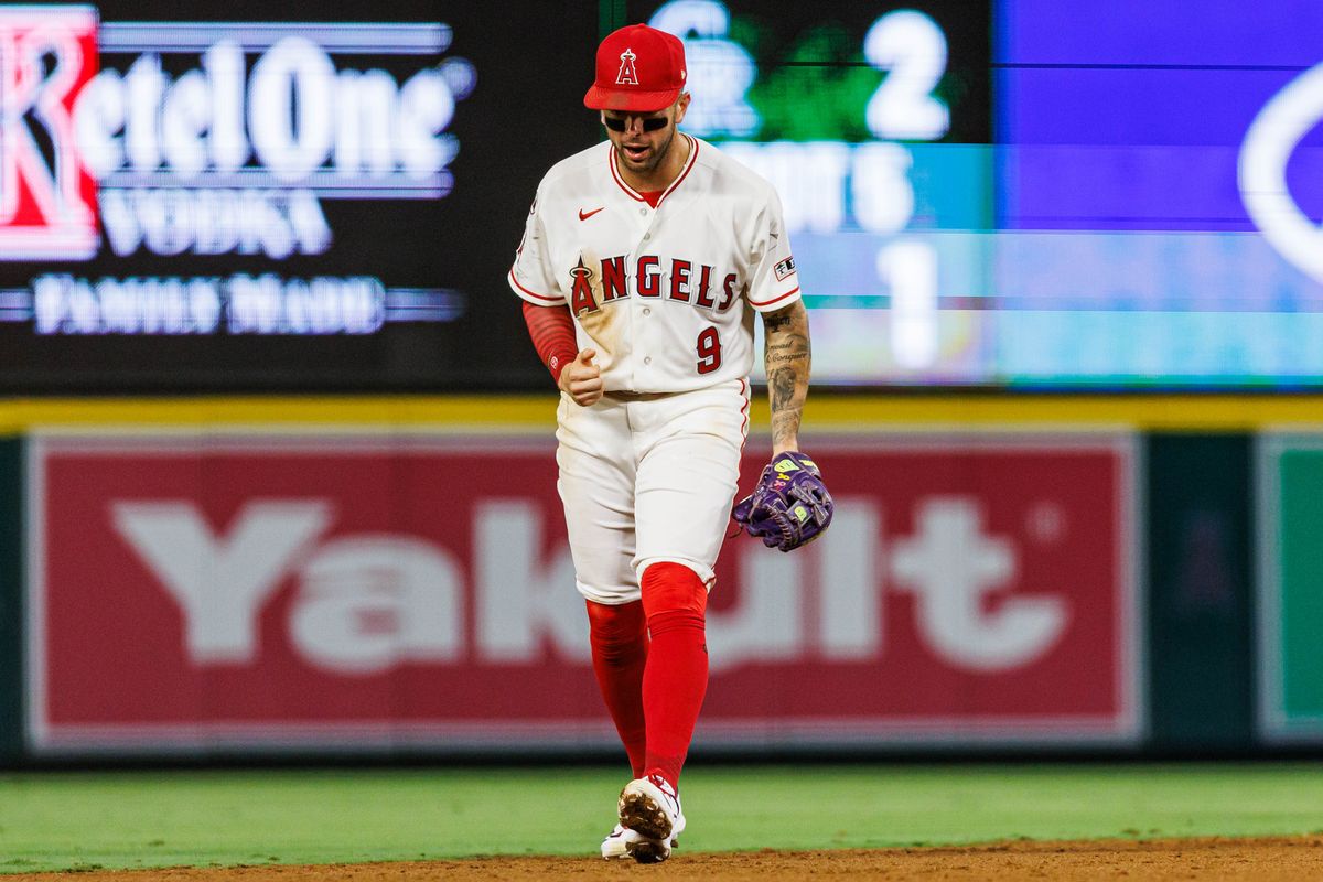 Zach Neto #9 of the Los Angeles Angels celebrates after an inning ending strikeout during an MLB game against the Kansas City Royals on August 14, 2026 at Angel Stadium in Anaheim, California.