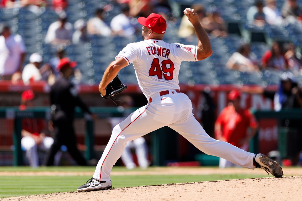 Michael Fulmer #49 of the Los Angeles Angels pitches during the game against the Kansas City Royals at Angel Stadium of Anaheim on August 16, 2026 in Anaheim, California.