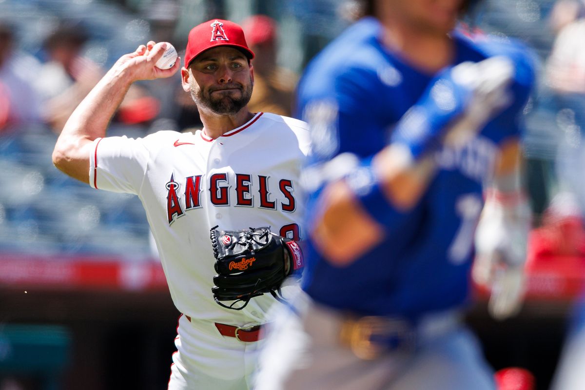 Michael Fulmer #49 of the Los Angeles Angels throws to first base during the game against the Kansas City Royals at Angel Stadium of Anaheim on August 16, 2026 in Anaheim, California. 