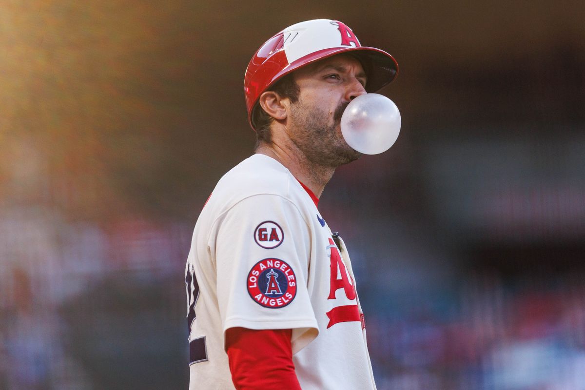 Adam Eaton #92 of the Los Angeles Angels watches on during MLB game against the Cleveland Guardians on August 24, 2026 at Angel Stadium in Anaheim, California.