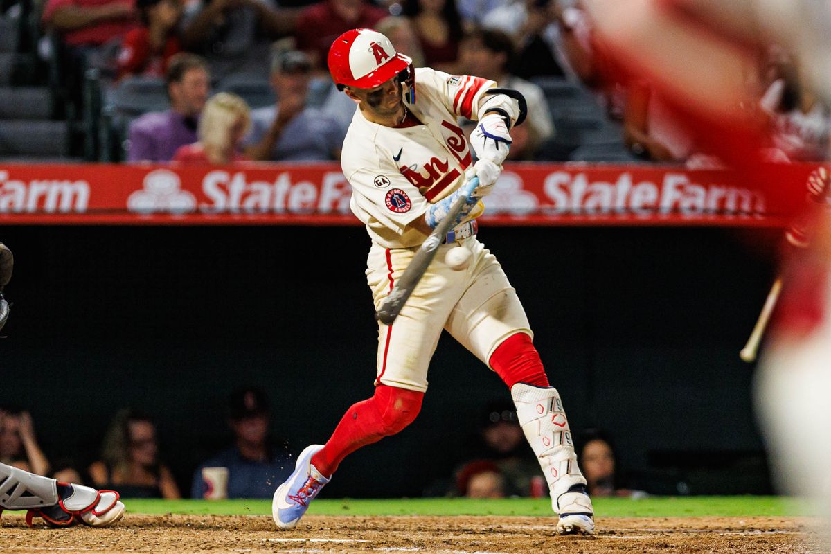 Zach Neto #9 of the Los Angeles Angels hits the ball during an MLB game against the Cleveland Guardians on August 24, 2026 at Angel Stadium in Anaheim, California.