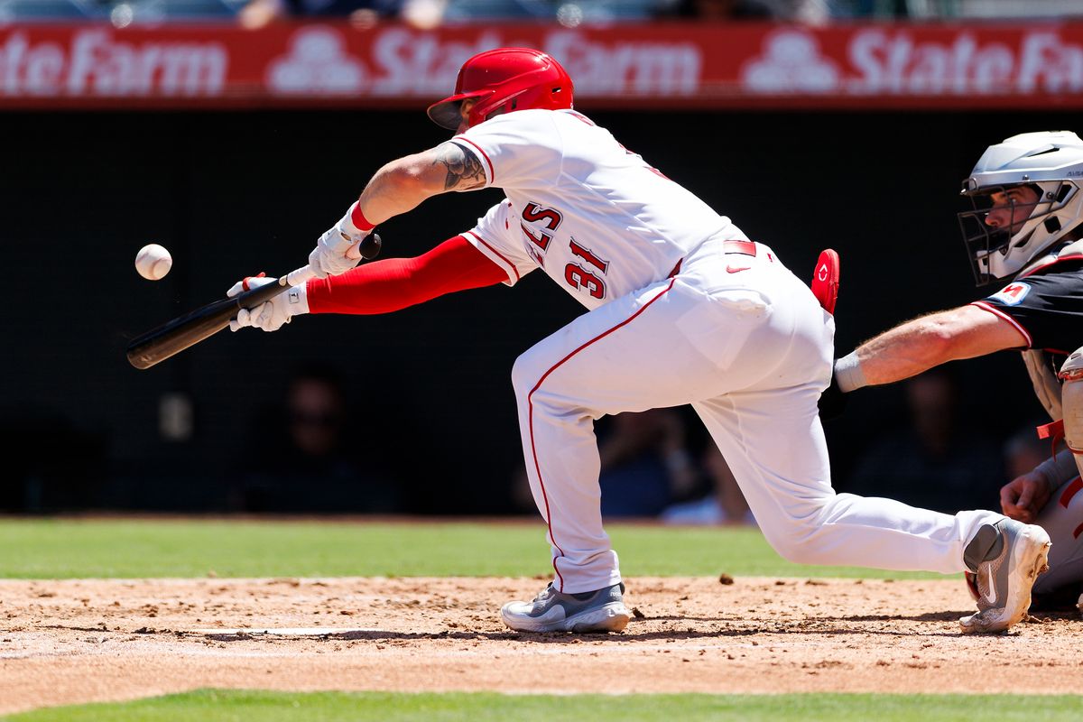 Tyler Heineman #31 of the Los Angeles Angels bunts during the game against the Cleveland Guardians at Angel Stadium of Anaheim on August 26, 2026 in Anaheim, California. Tyler Heineman #31 of the Los Angeles Angels bunts during the game against the Cleveland Guardians at Angel Stadium of Anaheim on August 26, 2026 in Anaheim, California.