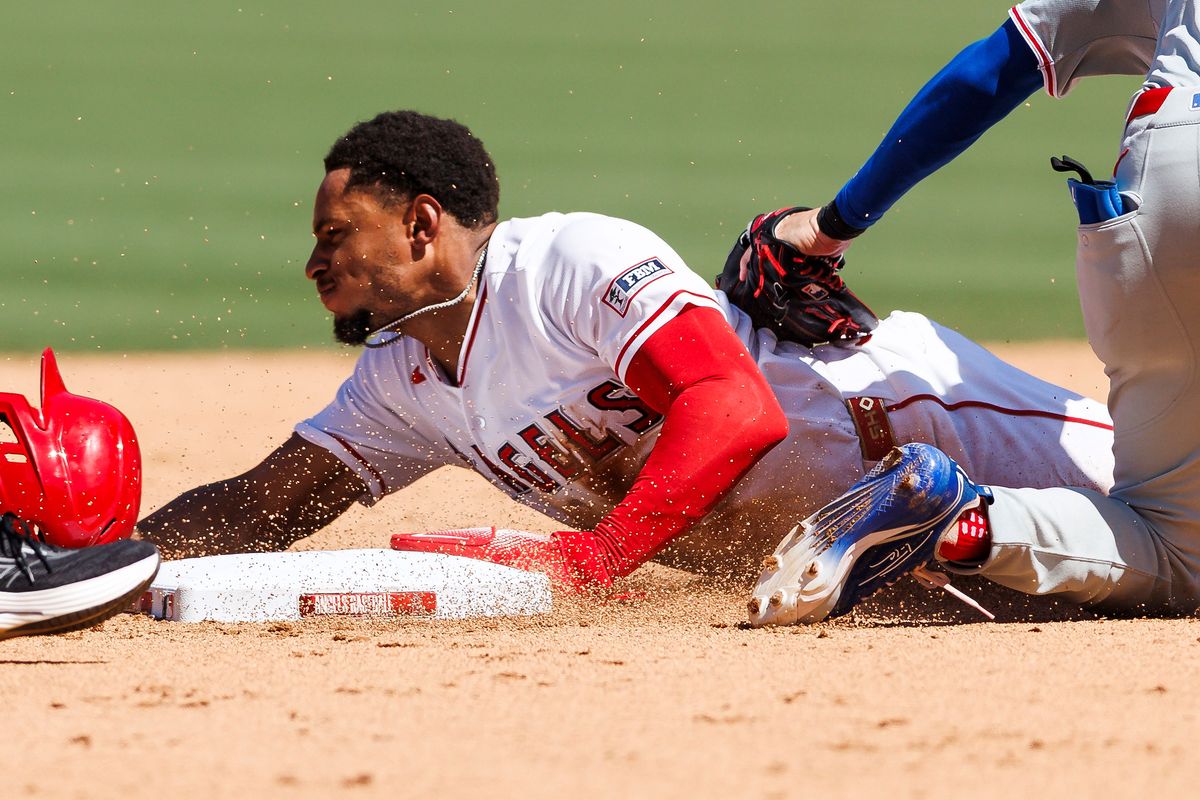 Christian Moore #4 of the Los Angeles Angels slides into second base during the game against the Philadelphia Phillies at Angel Stadium of Anaheim on August 30, 2026 in Anaheim, California. Christian Moore #4 of the Los Angeles Angels slides into second base during the game against the Philadelphia Phillies at Angel Stadium of Anaheim on August 30, 2026 in Anaheim, California.