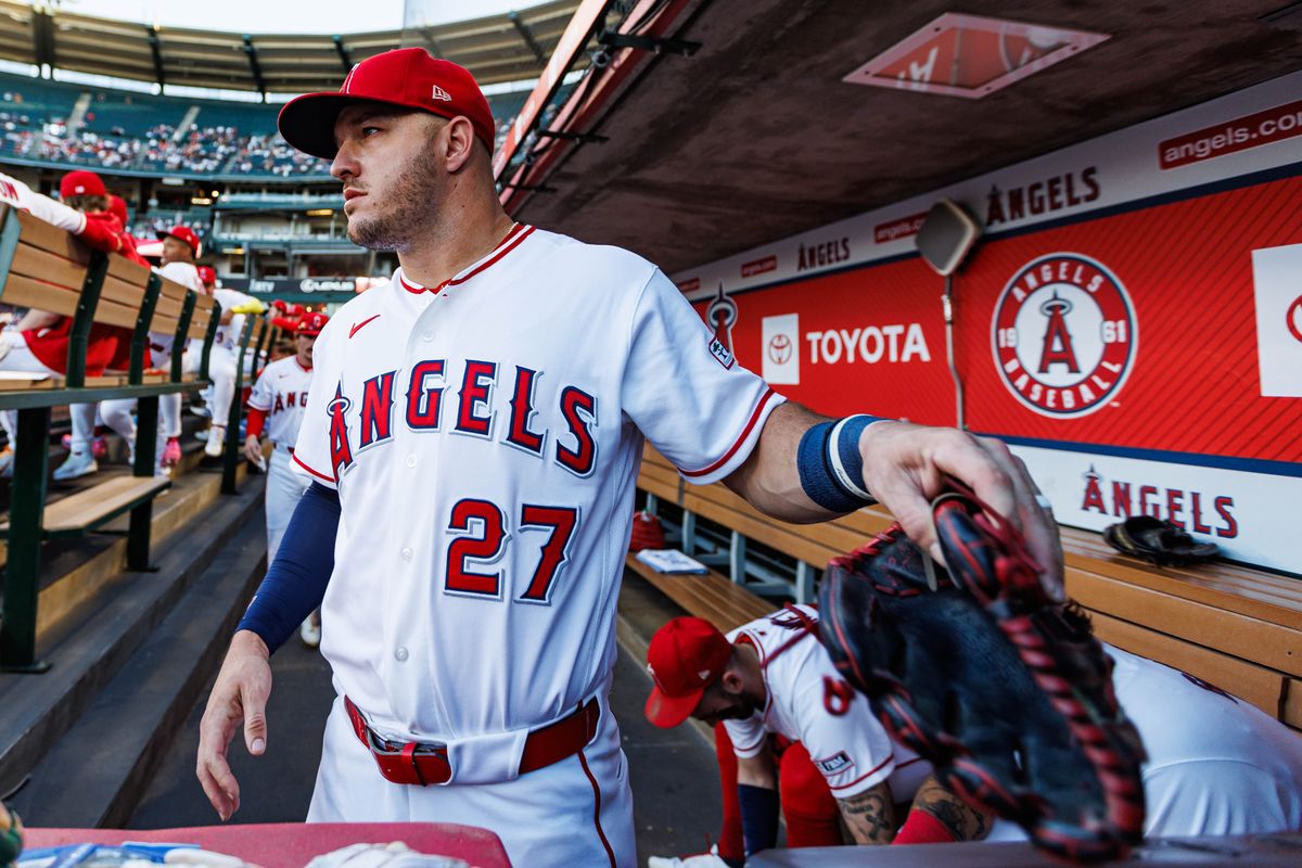 Mike Trout #27 of the Los Angeles Angels grabs his glove before an MLB game against the New York Yankees on September 2, 2026 at Angel Stadium in Anaheim, California.