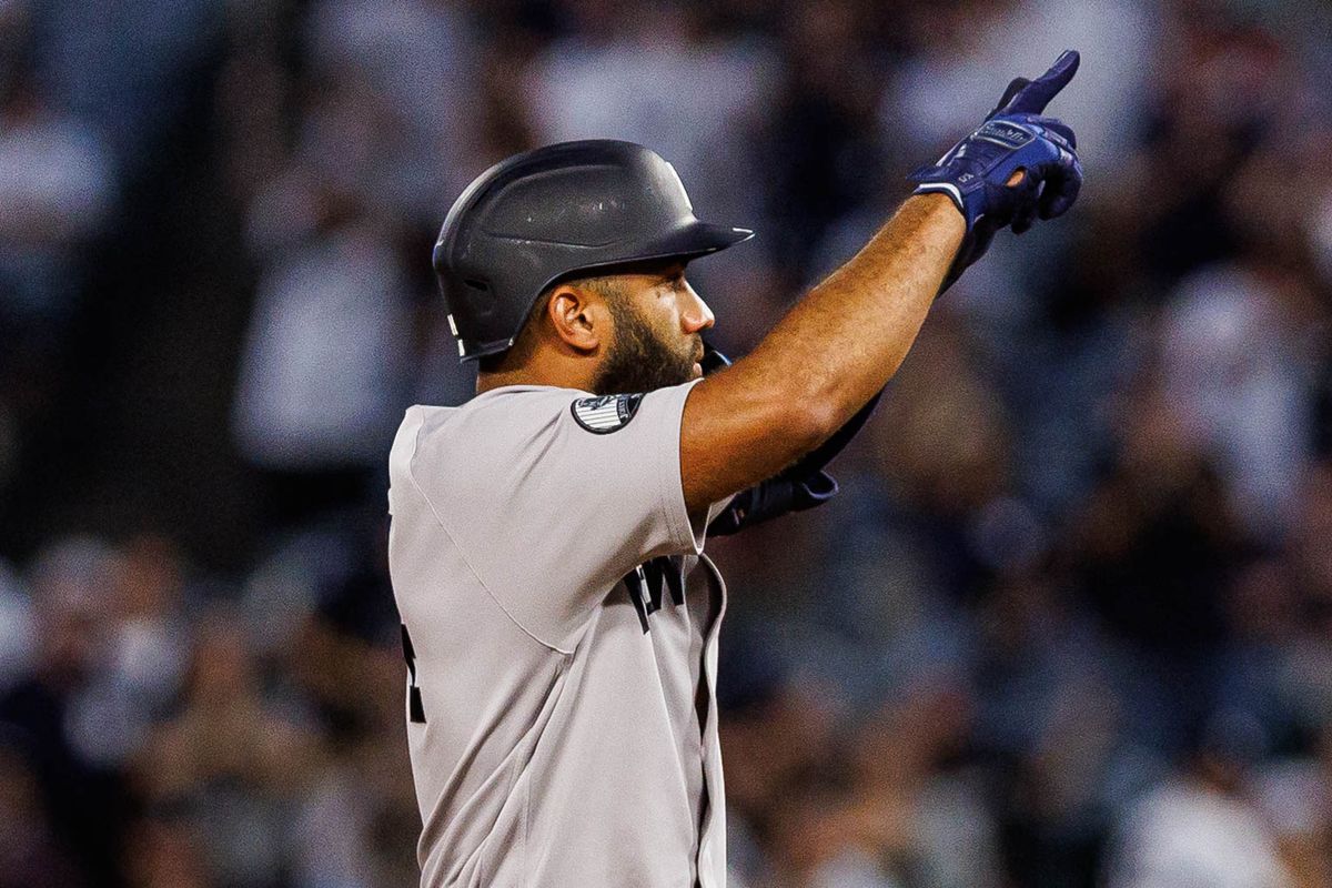 Amed Rosario #14 of the New York Yankees celebrates after hitting an RBI double during an MLB game against the Los Angeles Angels on September 2, 2026 at Angel Stadium in Anaheim, California.
