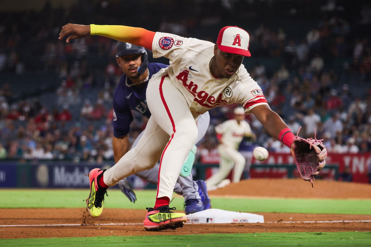 Los Angeles Angels infielder Denzer Guzman (23) reaches for the ball during the MLB game against the Seattle Mariners Tuesday September 15th, 2026 at Angel Stadium in Anaheim, Calif. Los Angeles Angels infielder Denzer Guzman (23) reaches for the ball during the MLB game against the Seattle Mariners Tuesday September 15th, 2026 at Angel Stadium in Anaheim, Calif.