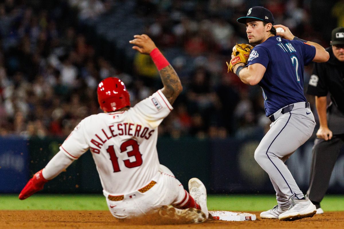 Cole Young #2 of the Seattle Mariners attempts to complete a double play during an MLB game against the Los Angeles Angels on September 16, 2026 at Angel Stadium in Anaheim, California. Cole Young #2 of the Seattle Mariners attempts to complete a double play during an MLB game against the Los Angeles Angels on September 16, 2026 at Angel Stadium in Anaheim, California.